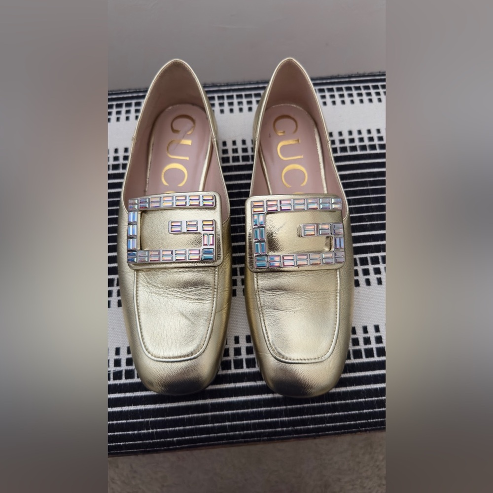 Gucci gold flats